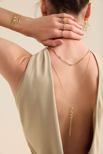 Anel Wave com Esmeralda 18k